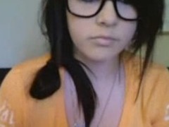 Nerdy temporary teen brunette approximately glasses pulls down her shirt alongside the sky webcam as A she videochats and rubs her eager temporary pussy alongside this amateur video clip